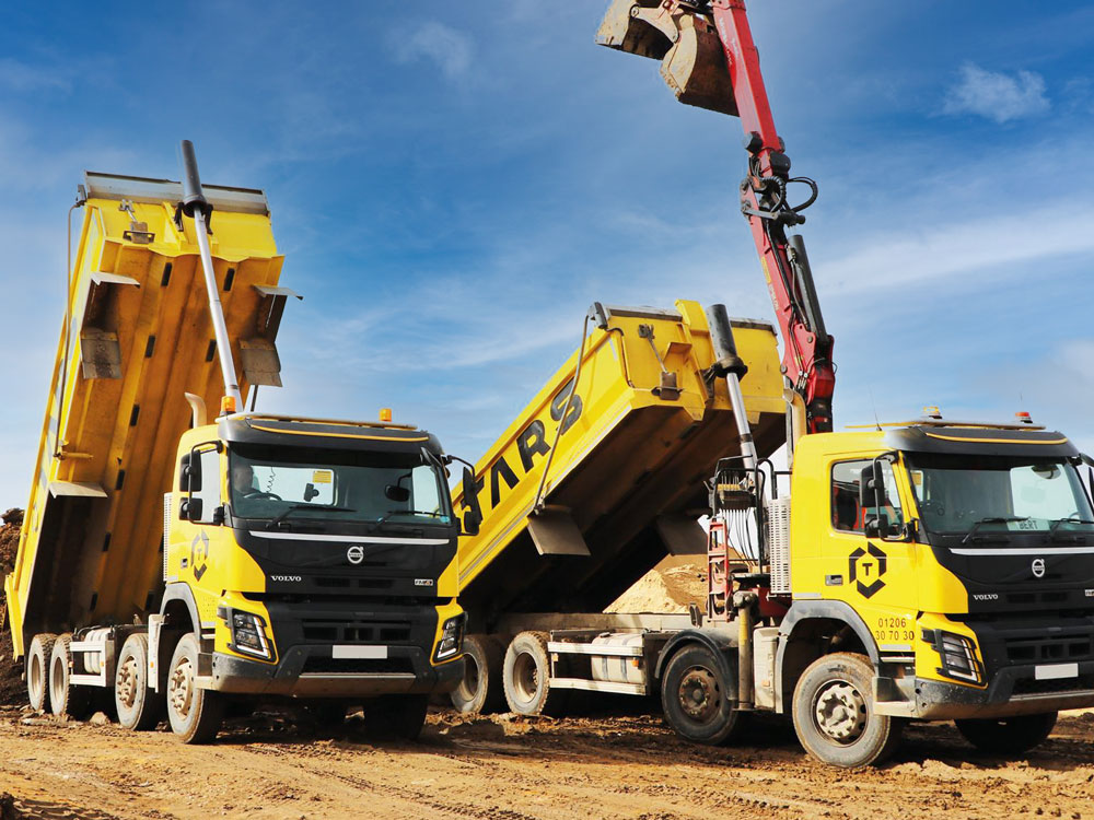 Two TARS Yellow Tipper and Grab Lorries